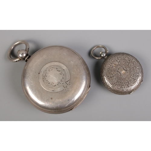 344 - A silver pocket watch, with engine turned back and Harris of Leeds white enameled dial with Roman Nu... 