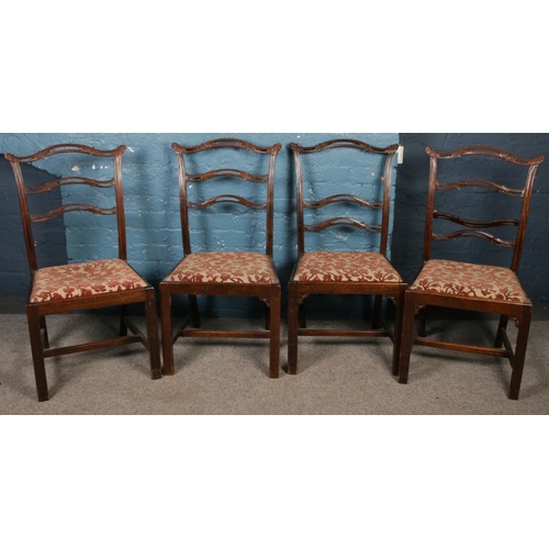 436 - A set of 8 carved ladder back dining chairs. Including two carver examples.