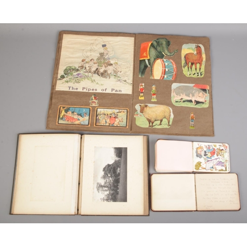 125 - A quantity of albums and contents. Including illustration by F.G Walker, sketches, messages, etc.