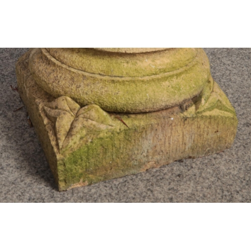 288 - A pair of cast stone bird baths of circular form, with twisted pillars raised on square plinths with... 