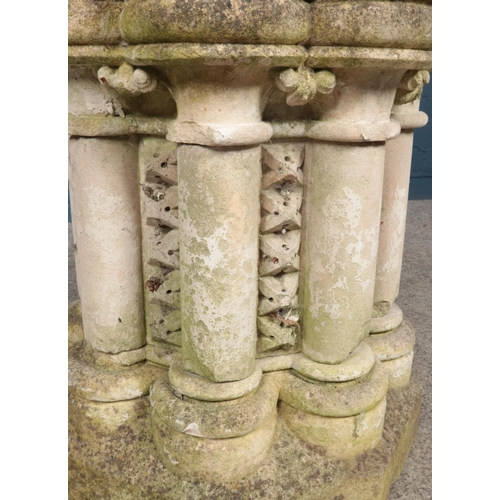 296 - A carved limestone octagonal garden pedestal plinth, of font design, with detachable top and turned ... 