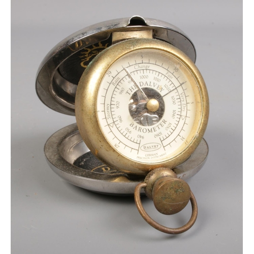 363 - A Dalvey pocket barometer. H:8cm W:8cm.