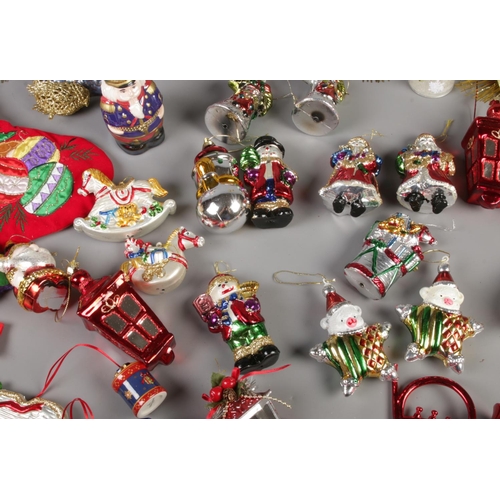 184 - A collection of vintage Christmas decorations. To include baubles, light up stocking etc.