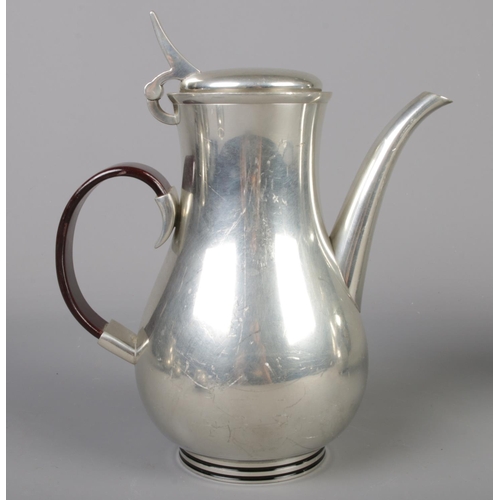 86 - Gerald Benney Selangor pewter. To include two coffee pots, teapot, milk jug and sugar bowl.