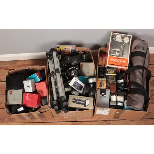 174 - Three large boxes of assorted camera accessories, to include flashes, glass slides and tripods. Rico... 