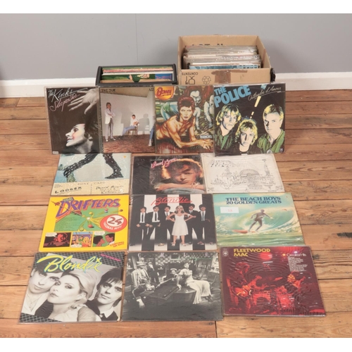 178 - A large box and carry case of vinyl records. To include David Bowie, Blondie, Pink Floyd, The Kinks ... 