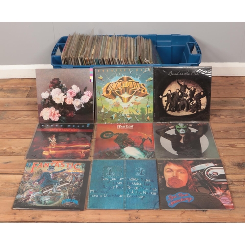 179 - A large storage box containing a good collection of rock and pop vinyl records. To include New Order... 