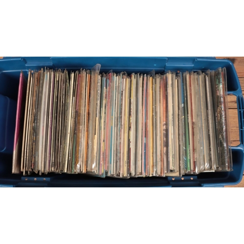 179 - A large storage box containing a good collection of rock and pop vinyl records. To include New Order... 