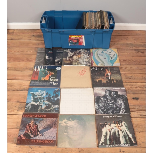 181 - A large storage box containing a good collection of rock and pop vinyl records. To include ABC, Hot ... 