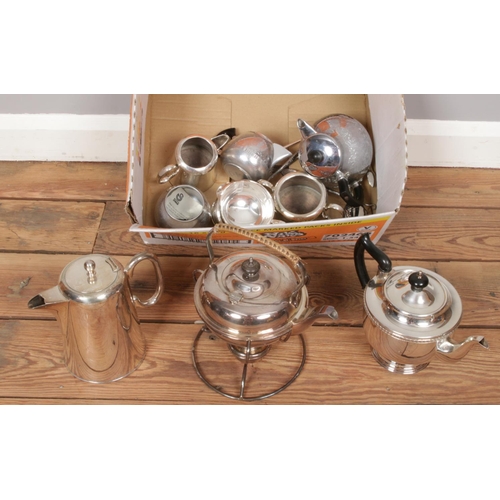 182 - A box of silver plate. Including spirit kettle, teawares, etc.