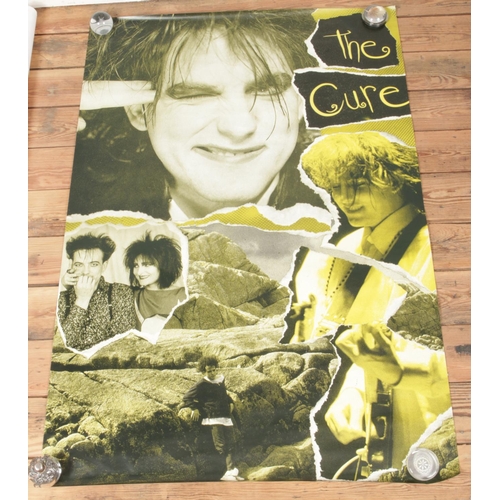 293 - Two subway posters, advertising The Cure (140cm x 94cm) and The Stone Roses (138cm x 100cm).