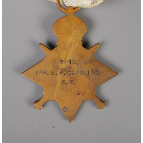 387 - A 1914-15 Star Medal, awarded to SPR. E.W. Capeling 7412, together with a small bugle badge.