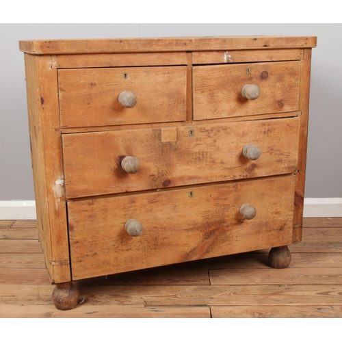 524 - A pine chest of two over two drawers. Height: 89cm, Width: 98cm, Depth 44cm.