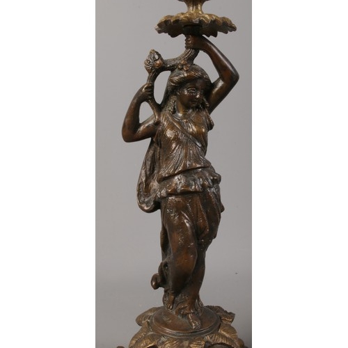 93 - A pair of Souchal bronze three branch candelabras. Decorated with women and foliage.  Stamped Soucha... 