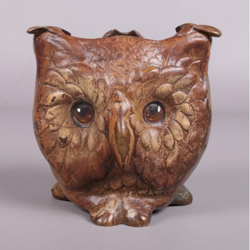 57 - An Austrian cold painted bronze novelty three sided ash tray, depicting the faces of an owl, a cat a... 