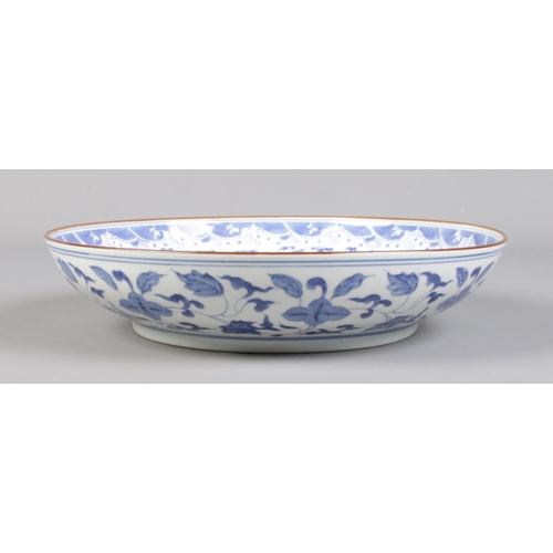 104 - A Chinese dish decorated in underglaze blue with Qilins, bearing six character Zhengde marks to base... 