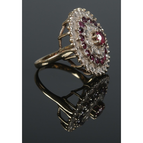 114 - A vintage 9ct gold ruby and diamond cluster ring. Assayed for Birmingham 1979. Size O. 6.34g.