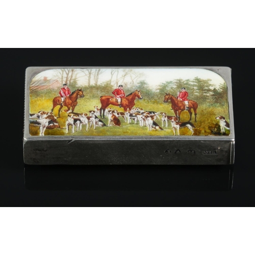 126 - A Victorian silver and enamel vesta case, decorated with a hunting scene. Assayed 1890 by Sampson Mo... 