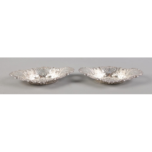 38 - A pair of Edwardian silver pierced lozenge shaped dishes. Assayed Sheffield 1903 by Cooper Brothers ... 