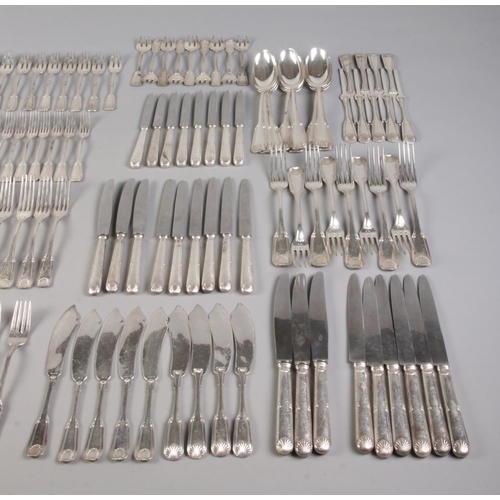 43 - A comprehensive collection of assembled silver cutlery all with matching shell motif decoration, pos... 