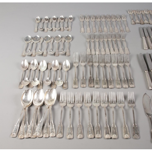 43 - A comprehensive collection of assembled silver cutlery all with matching shell motif decoration, pos... 