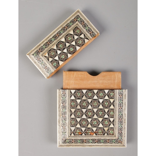 59 - An Indian Vizagapatam bone card case, inlaid with semi precious stones and silver.