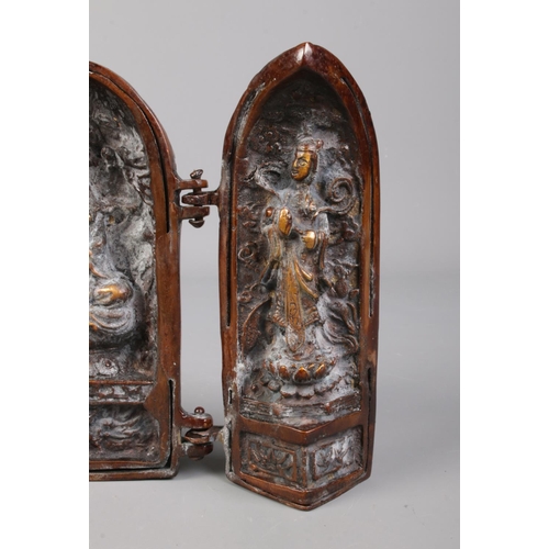 97 - A Chinese bronze triptych shrine.