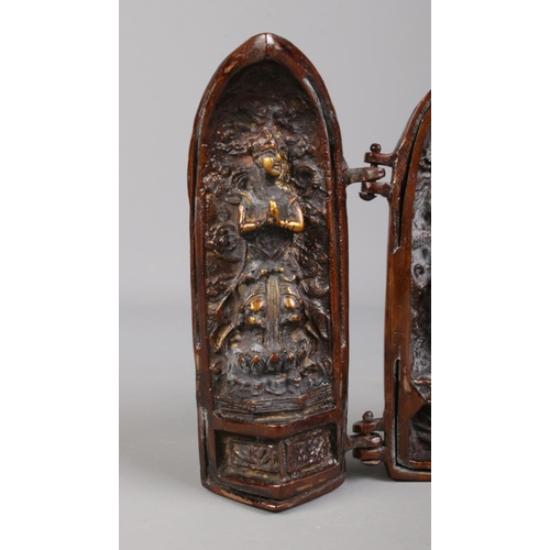 97 - A Chinese bronze triptych shrine.