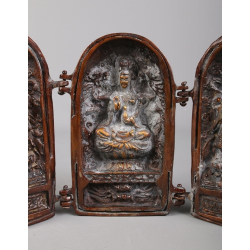 97 - A Chinese bronze triptych shrine.