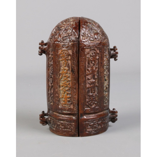 97 - A Chinese bronze triptych shrine.