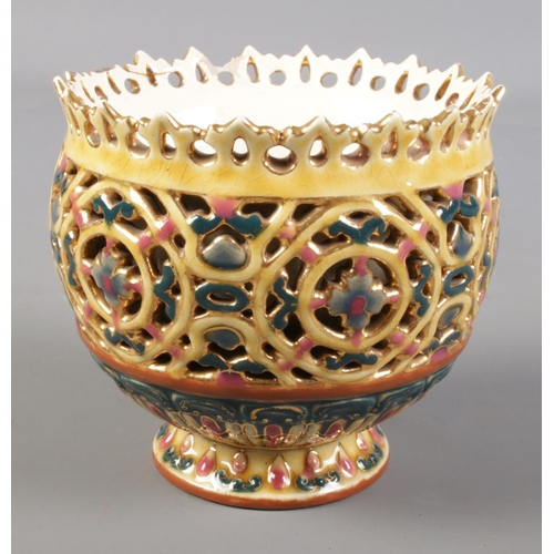 304 - A Zsolnay Pecs reticulated pedestal bowl. Stamped to base 1026.