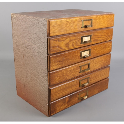 305 - A specimen chest of six drawers. (40cm x 39cm x 28cm)