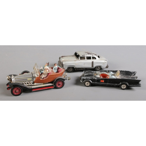 308 - A Corgi Chitty Chitty Bang Bang diecast model along with a Corgi Batmobile model and a tin plate exa... 