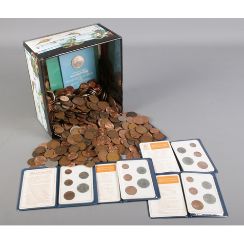 301 - A quantity of British pre decimal coins. Including farthings, pennies, etc.