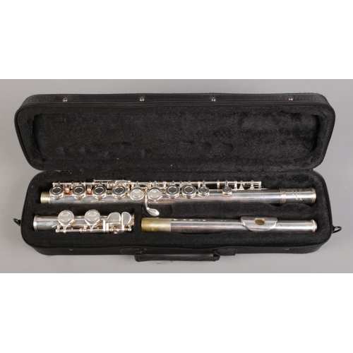 109 - A cased three piece Elkhart flute.