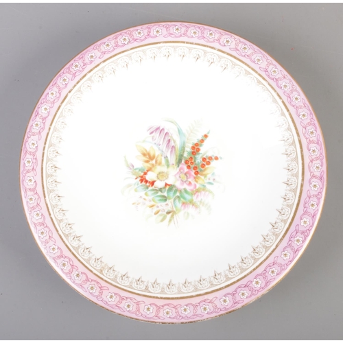 123 - A Royal Worcester hand painted dessert service. To include two comports and seven plates. Design dep... 