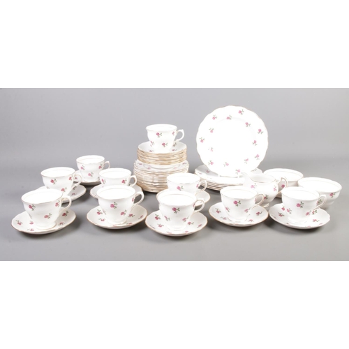 250 - Over forty pieces of Colclough Ditsy Rose pattern tea set. To include cups, saucers, milk and sugar ... 