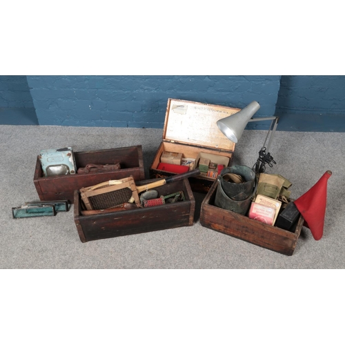 256 - Three vintage crates containing a variety of collectables, to include Anglepoise lamp, cased bowls, ... 