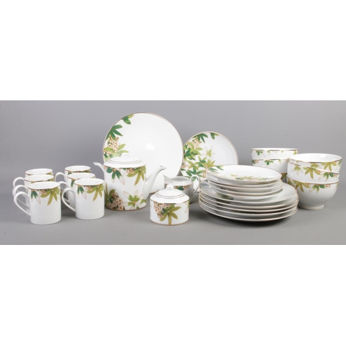 257 - A collection of 'Star by Julienmacdonald' dinner wares. 'Kimono flower' To include teapot, mugs, mil... 