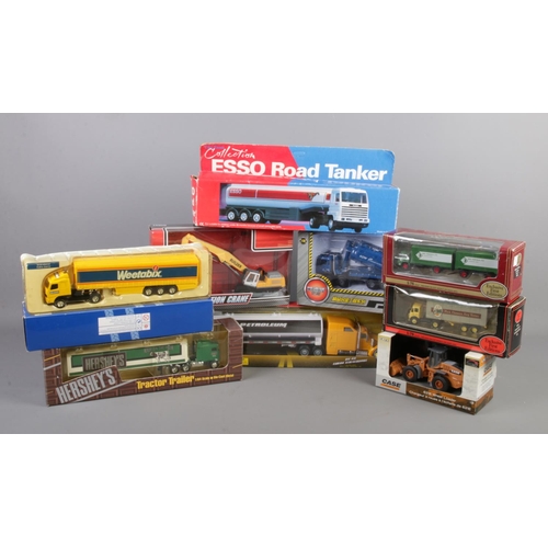 261 - A selection of eight die-cast vehicles in boxes. To include two Gilbow 1st editions trucks, a Corgi ... 