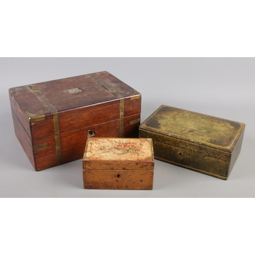 66 - An antique brassbound box along with a leather jewellery box and smaller wooden box.