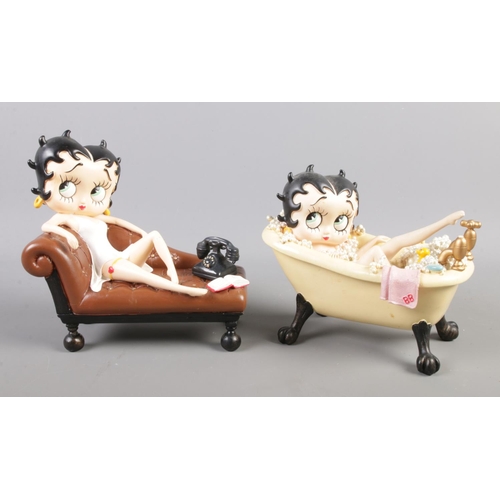 77 - Two Betty Boop figures by King Features Syndicate. Tallest: H:18.5cm.