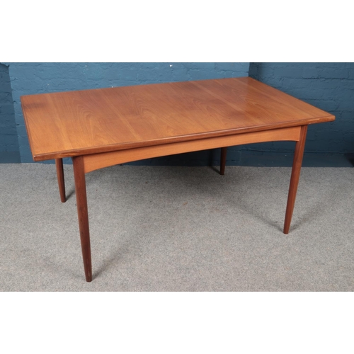 606 - A teak G-Plan extending dining table. (152cm x 72cm)