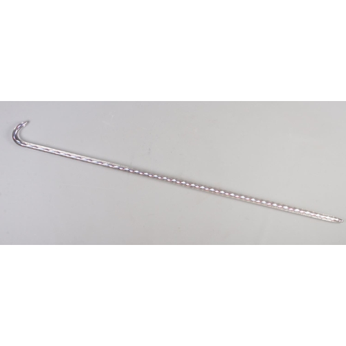 91 - A glass cane with twisted decoration.