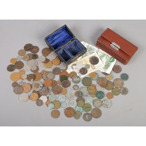 99 - A small box of British and World coins. Includes some Victorian examples.