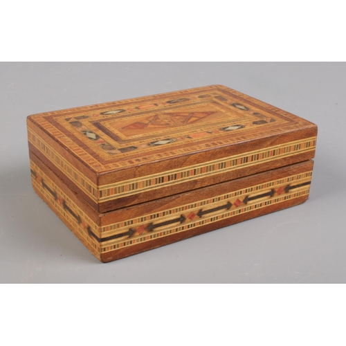 132 - Two decorative wooden page turners and marquetry box. To include Bamboo and Maple page turners with ... 