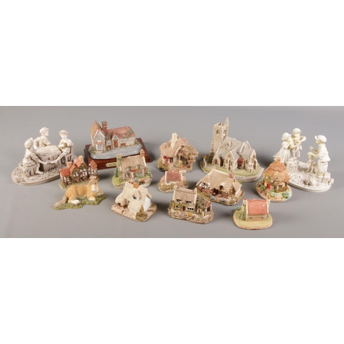 109 - A collection of composite and ceramic models. Includes Lilliput Lane, David Winter, Regency Fine Art... 