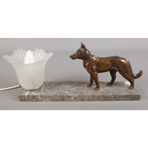 138 - An Art Deco table lamp with marble base and mounted bronzed Alsatian dog.