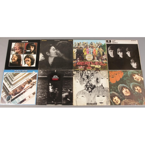 149 - Eight Beatles and John Lennon L.P records. Including Revolver, Sgt Pepper, Let it Be, etc.