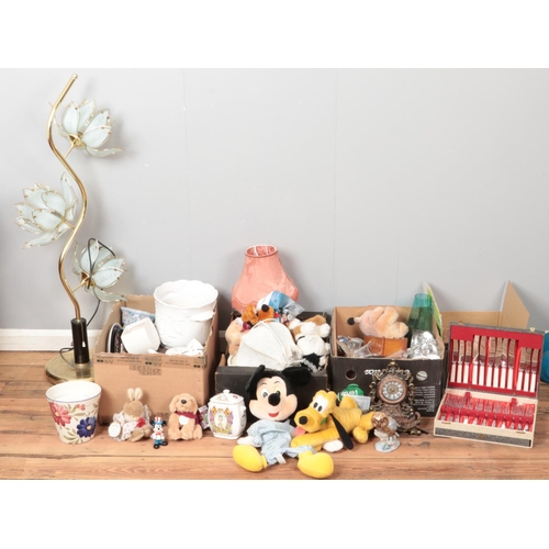 225 - Four boxes of miscellaneous. Including Disney figures and teddies, brass and glass lamp, planters, f... 